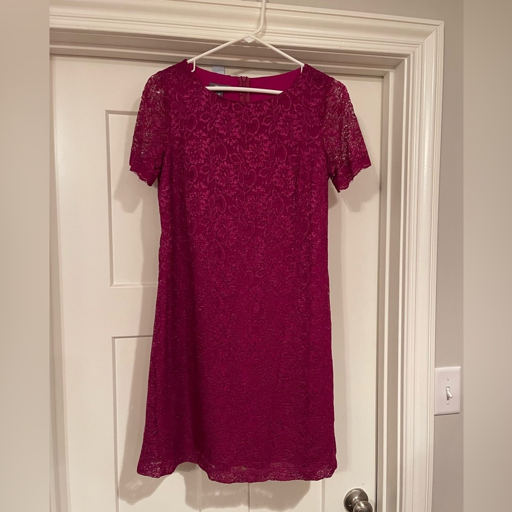 Like new worn once. Size 6 fuchsia dress.
